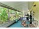 Bright screened porch, great for relaxing and enjoying the outdoors at 718 N Jefferson Ave # 718, Sarasota, FL 34237