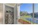 Storage closet and screened balcony with pond view at 850 S Tamiami Trl # 731, Sarasota, FL 34236