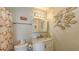Clean bathroom with a single vanity, toilet and shower at 850 S Tamiami Trl # 731, Sarasota, FL 34236