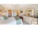 Full-size bed, dresser, and ensuite bathroom in this bedroom at 850 S Tamiami Trl # 731, Sarasota, FL 34236