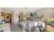 Cozy bedroom with a full-size bed and ensuite bathroom access at 850 S Tamiami Trl # 731, Sarasota, FL 34236