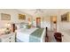 Bedroom with a full-size bed and access to a private bathroom at 850 S Tamiami Trl # 731, Sarasota, FL 34236