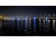 City skyline and bridge at night with blue lighting at 850 S Tamiami Trl # 731, Sarasota, FL 34236