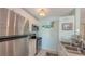 Modern kitchen with stainless steel appliances and light cabinetry at 850 S Tamiami Trl # 731, Sarasota, FL 34236