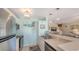 Updated kitchen features stainless steel appliances and a breakfast bar at 850 S Tamiami Trl # 731, Sarasota, FL 34236