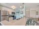Bright kitchen with stainless steel appliances and breakfast bar at 850 S Tamiami Trl # 731, Sarasota, FL 34236
