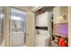 Convenient laundry room with stackable washer and dryer at 850 S Tamiami Trl # 731, Sarasota, FL 34236