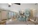 Living room with view of kitchen and dining area at 850 S Tamiami Trl # 731, Sarasota, FL 34236