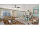 Open concept living space with adjoining kitchen and dining areas at 850 S Tamiami Trl # 731, Sarasota, FL 34236