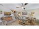 Cozy living room featuring a comfortable sofa and large TV at 850 S Tamiami Trl # 731, Sarasota, FL 34236