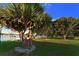 Lush green park with mature trees and waterfront views at 850 S Tamiami Trl # 731, Sarasota, FL 34236