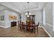 Elegant dining room featuring a large table and a beautiful chandelier at 112 170Th E St, Bradenton, FL 34212