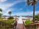 Walk to the beach via boardwalk, enjoy beach umbrellas and chairs at 1211 Gulf Of Mexico Dr # 401, Longboat Key, FL 34228