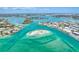 Aerial view showcasing waterfront property and surrounding area at 1342 Calais Cir, North Venice, FL 34275