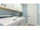 Convenient laundry room with LG washer and dryer and ample storage at 1342 Calais Cir, North Venice, FL 34275