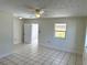 Bright living room featuring tile floors and access to the backyard at 1605 32Nd W St, Bradenton, FL 34205