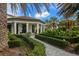 Private backyard patio with walkway and lush landscaping at 224 Corelli Dr, Nokomis, FL 34275