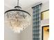Close-up of a crystal chandelier in the dining area at 224 Corelli Dr, Nokomis, FL 34275