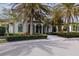 Community clubhouse with lush landscaping at 224 Corelli Dr, Nokomis, FL 34275