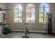 Fitness center with scenic views and various exercise machines at 224 Corelli Dr, Nokomis, FL 34275