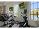 Modern fitness center with cardio and weight equipment at 224 Corelli Dr, Nokomis, FL 34275