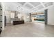 Spacious kitchen with an island, stainless steel appliances, and a large window at 224 Corelli Dr, Nokomis, FL 34275