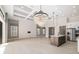 Bright living room with hardwood floors and large windows at 224 Corelli Dr, Nokomis, FL 34275