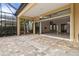 Spacious patio with sliding doors leading inside at 224 Corelli Dr, Nokomis, FL 34275