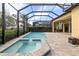 Inviting screened pool and spa with brick coping at 224 Corelli Dr, Nokomis, FL 34275