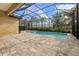 Inviting screened-in pool and spa area at 224 Corelli Dr, Nokomis, FL 34275