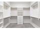 Spacious walk-in closet with ample shelving and drawers at 224 Corelli Dr, Nokomis, FL 34275