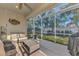 Screened-in patio or lanai area perfect for relaxing and enjoying the outdoors at 2520 Terracina Dr, Venice, FL 34292