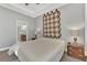 Spacious main bedroom with ensuite bathroom and plush carpeting at 2520 Terracina Dr, Venice, FL 34292