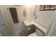 View of bathroom vanity, toilet, and updated flooring at 3333 26Th E Ave # 1107, Bradenton, FL 34208