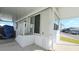 Front exterior view of a mobile home with stairs leading to the entrance at 3333 26Th E Ave # 1107, Bradenton, FL 34208
