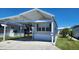 Delightful single-story home with carport and lush landscaping providing a comfortable living experience at 3333 26Th E Ave # 1107, Bradenton, FL 34208