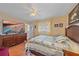 Large main bedroom with ample space, TV, and wooden dresser at 345 Glen Oak Rd, Venice, FL 34293