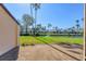 Backyard features a grassy area, water view, and neighborhood houses at 3468 51St Avenue W Dr, Bradenton, FL 34210