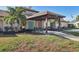 Exterior view of the community clubhouse with well-maintained landscaping and a convenient entrance at 3468 51St Avenue W Dr, Bradenton, FL 34210