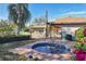 Community hot tub and nearby tennis courts surrounded by lush landscaping at 3468 51St Avenue W Dr, Bradenton, FL 34210