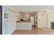 Traditional kitchen with a breakfast bar, wood cabinets, and tiled countertops at 3468 51St Avenue W Dr, Bradenton, FL 34210
