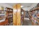 Community library featuring floor-to-ceiling bookshelves filled with numerous books at 3468 51St Avenue W Dr, Bradenton, FL 34210