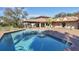 Community pool with lounge chairs, tables, and a covered patio area at 3468 51St Avenue W Dr, Bradenton, FL 34210