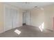 Bedroom featuring carpeted floors, closet and natural light at 4001 17Th W Ave, Bradenton, FL 34205
