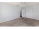 Bedroom featuring plush carpet flooring and ample closet space for storage at 4001 17Th W Ave, Bradenton, FL 34205