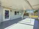 Relaxing screened patio with ample space for outdoor seating and entertaining at 4001 17Th W Ave, Bradenton, FL 34205