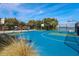 Outdoor basketball court with kayaks and waterfront view at 4234 Gulf Of Mexico Dr # Y1, Longboat Key, FL 34228