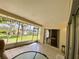 Spacious screened porch overlooking a grassy area at 4339 Bowling Green Cir # 19, Sarasota, FL 34233