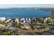 Aerial close-up showcasing a home with a pool and a picturesque coastal backdrop at 451 Bowdoin Cir, Sarasota, FL 34236