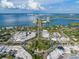 Aerial view of a charming coastal town with a roundabout and a view of the bay at 451 Bowdoin Cir, Sarasota, FL 34236